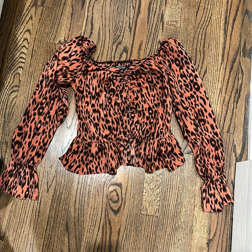 Rust colored animal print blouse!